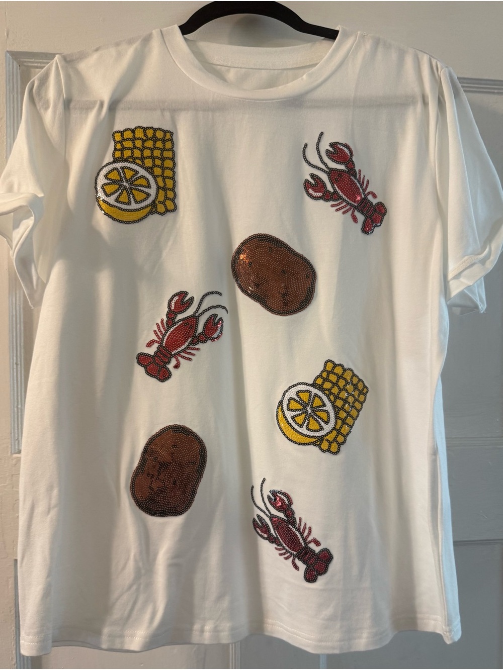 White Short Sleeve T‑Shirt with Crawfish/Lobster  & Corn Graphic